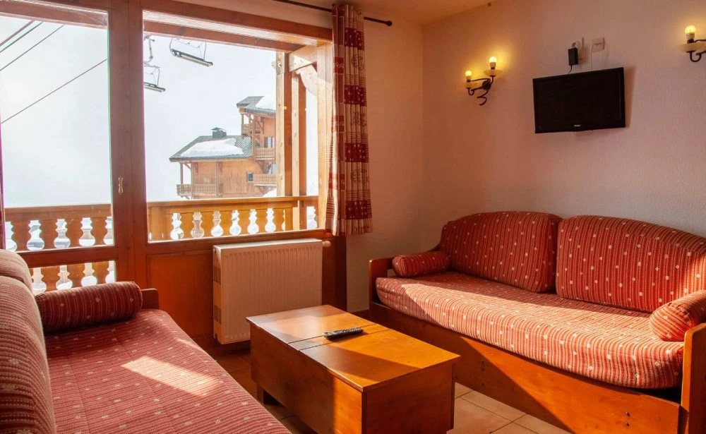 Les Balcons de Val Thorens - 2-kamer apt. voor max. 2 pers. woonkamer, bank, balkon met uitzicht