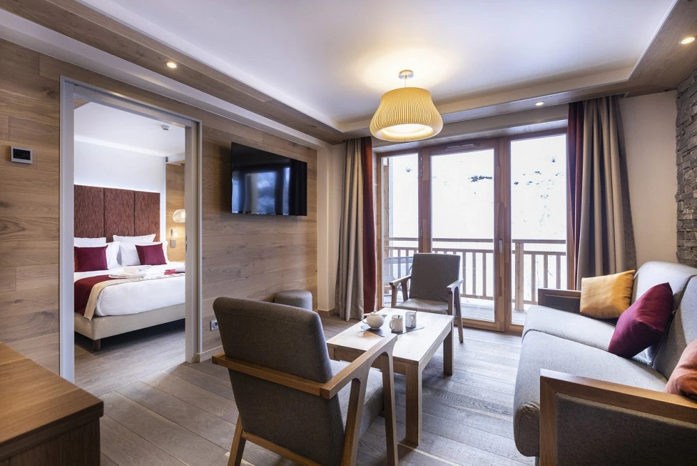 Les Balcons de Val Cenis PLATINUM - 4 appt 6 pers woonkamer met banken, stoelen en TV