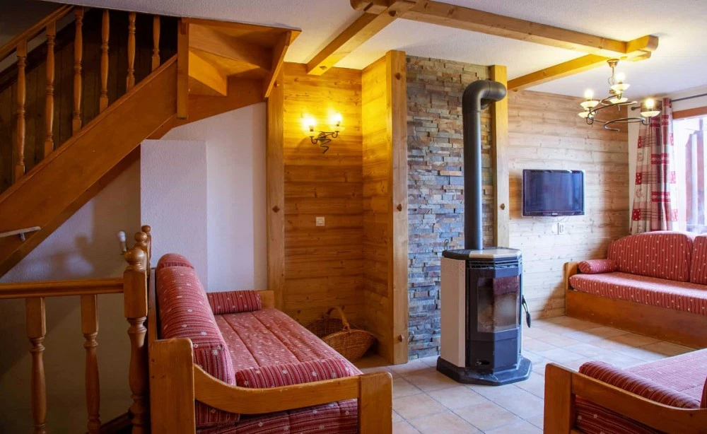 Les Balcons de Val Thorens Spa 7-kamer apt. voor max. 14 pers. woonkamer, openhaard, tv, bank