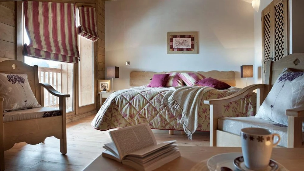Les Chalets de Jouvence - slaapkamer met balkon